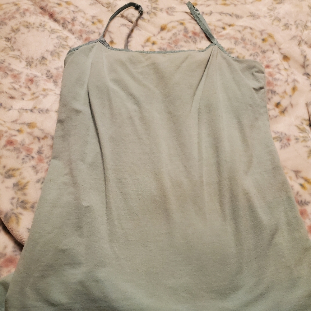 And blue tank top